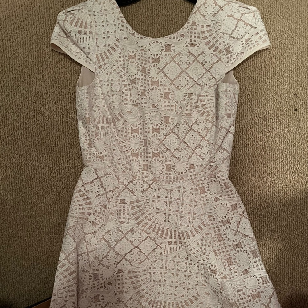 Beautiful cream off white Tibi dress with little cap sleeves.